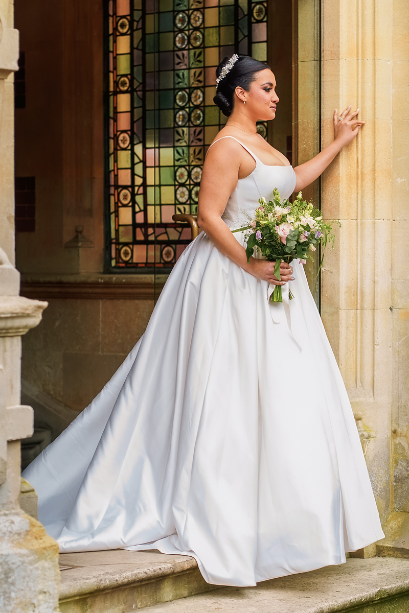 pendley manor wedding photographer - bride on door step