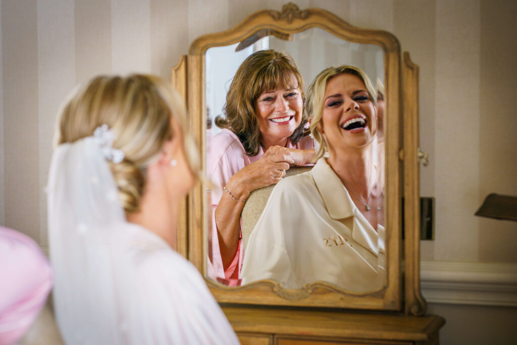 wedding timeline - bride and mum laughing