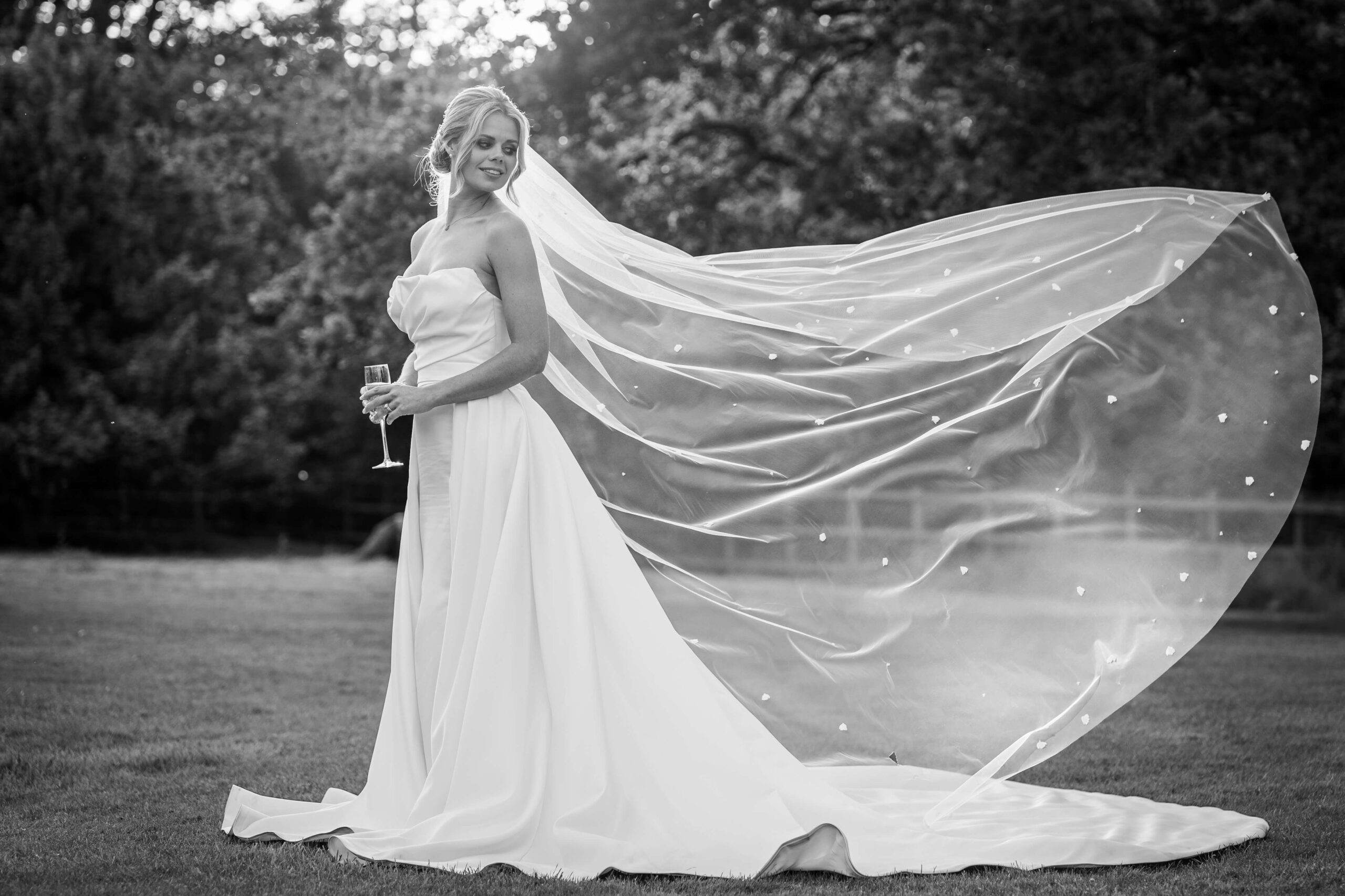 wedding traditions -  bride with her veil floating 