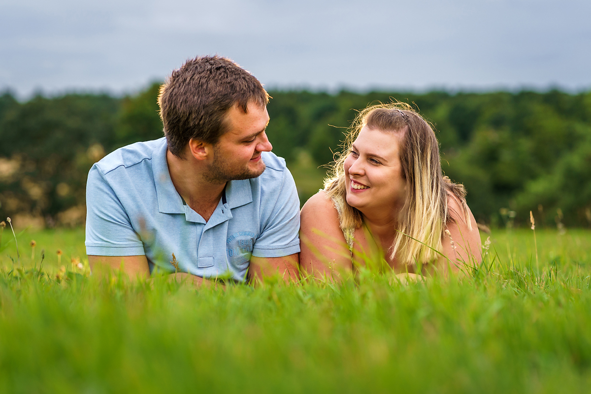 an engagement shoot taken in the lush greens of hertfordshire by a hertfordshire wedding photographer