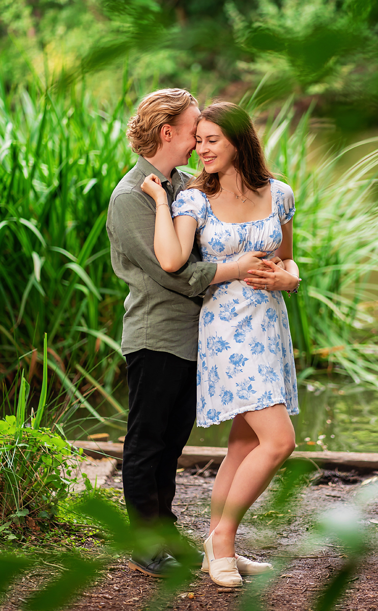 engagement shoot - a couple at their woodland engagement shoot taken by a hertfordshire wedding photographer