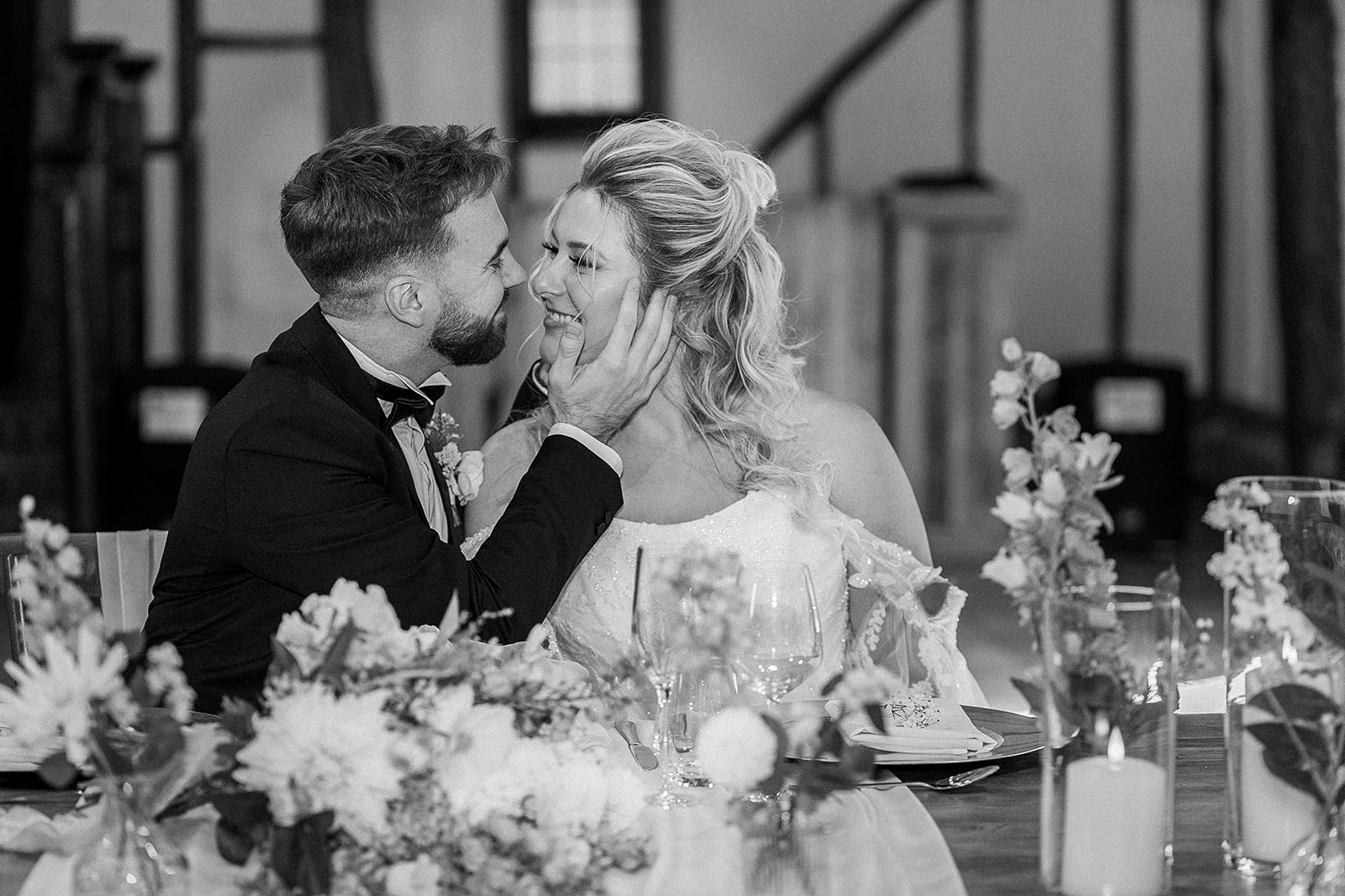 the married couple look into each others eyes lovingly.