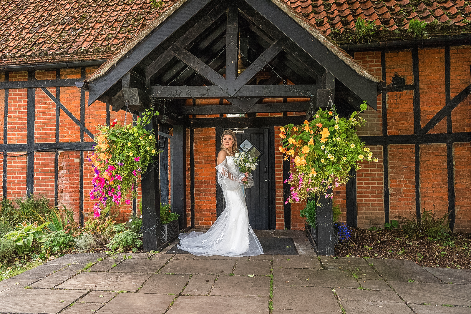 bride outside the barn door