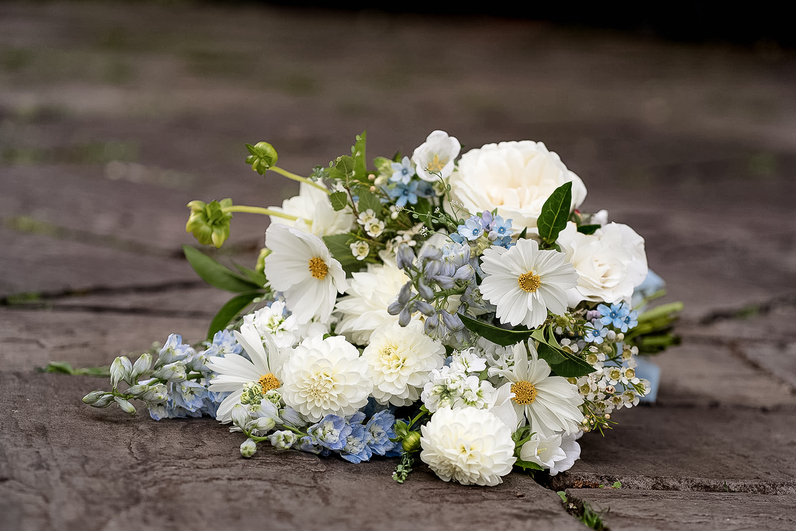 beautiful bridal bouquet with stunning white and blue flowers