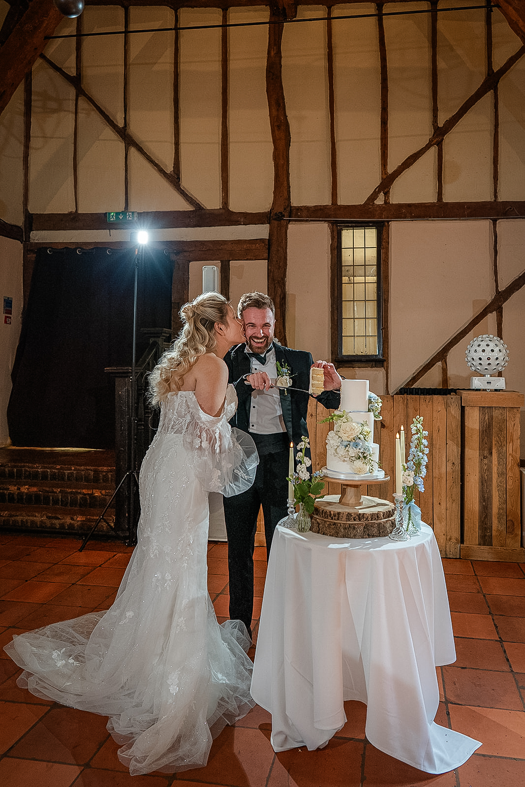couple cut their wedding cake