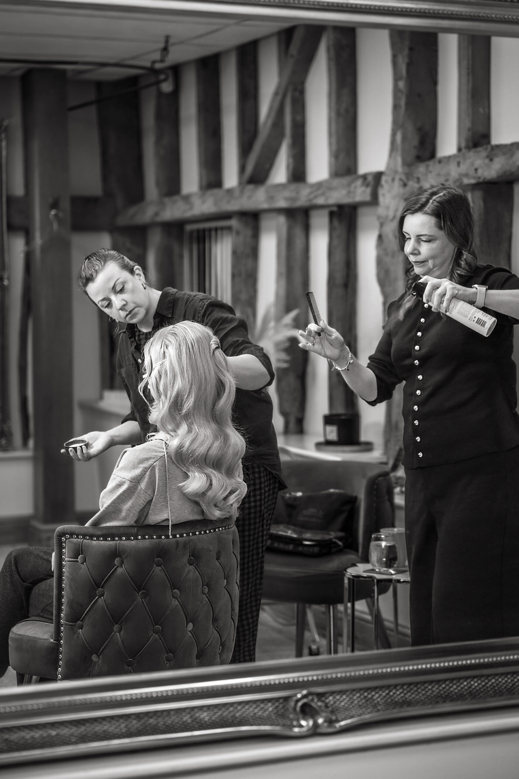 planning your wedding - hair and makeup artist attending to bride