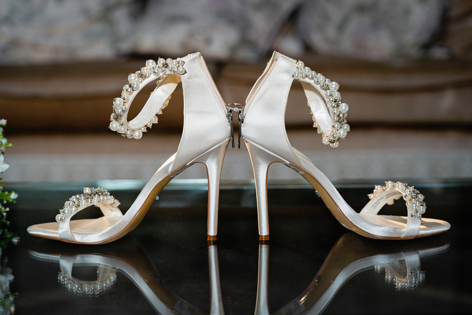 wedding at down hall- wedding shoes with engagement ring balanced between