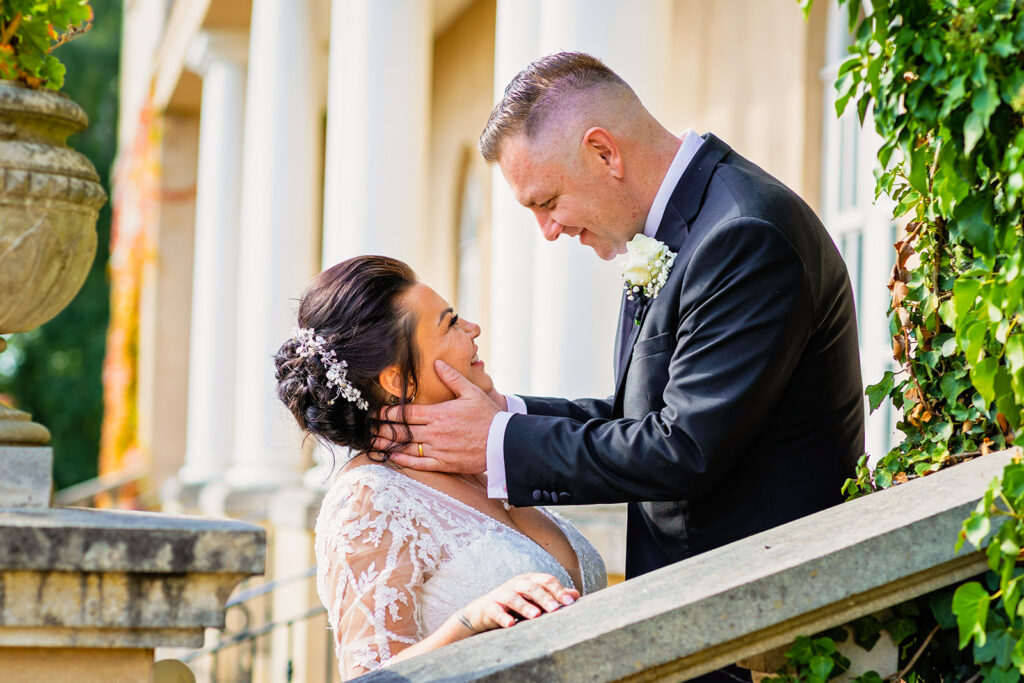 wedding at down hall - bride and groom go in for a kiss