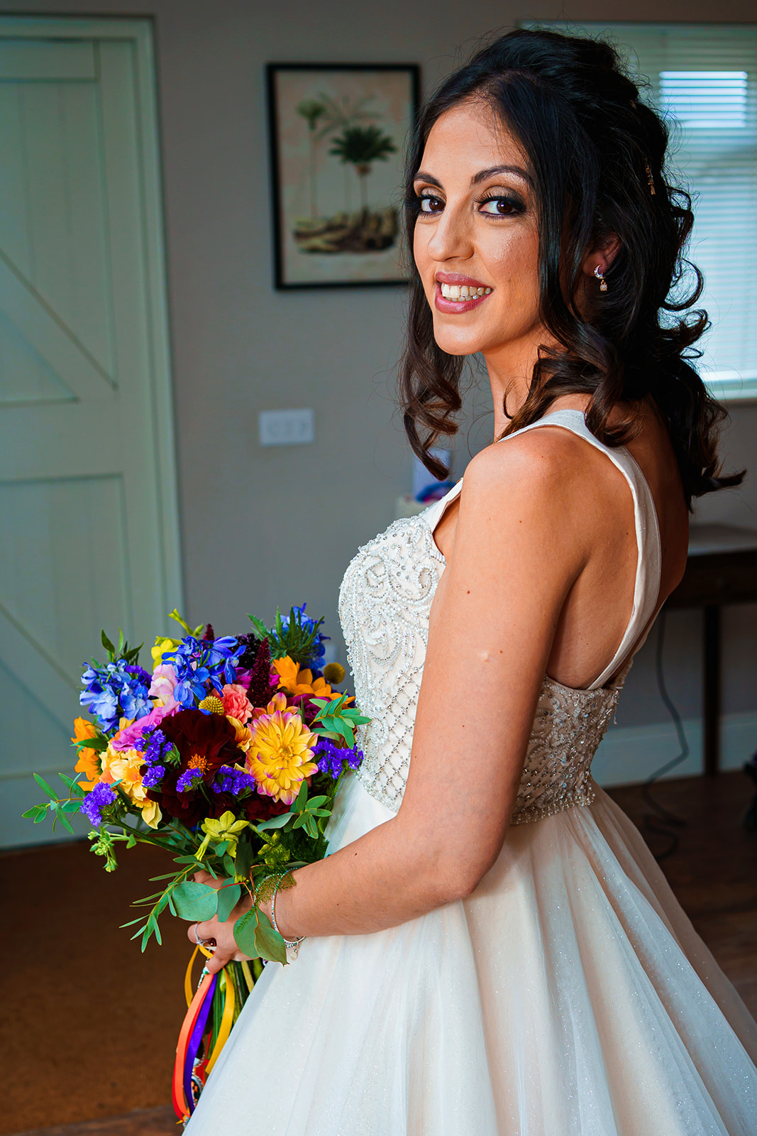 the barns at lodge farm wedding - bride on her own holding bouquet