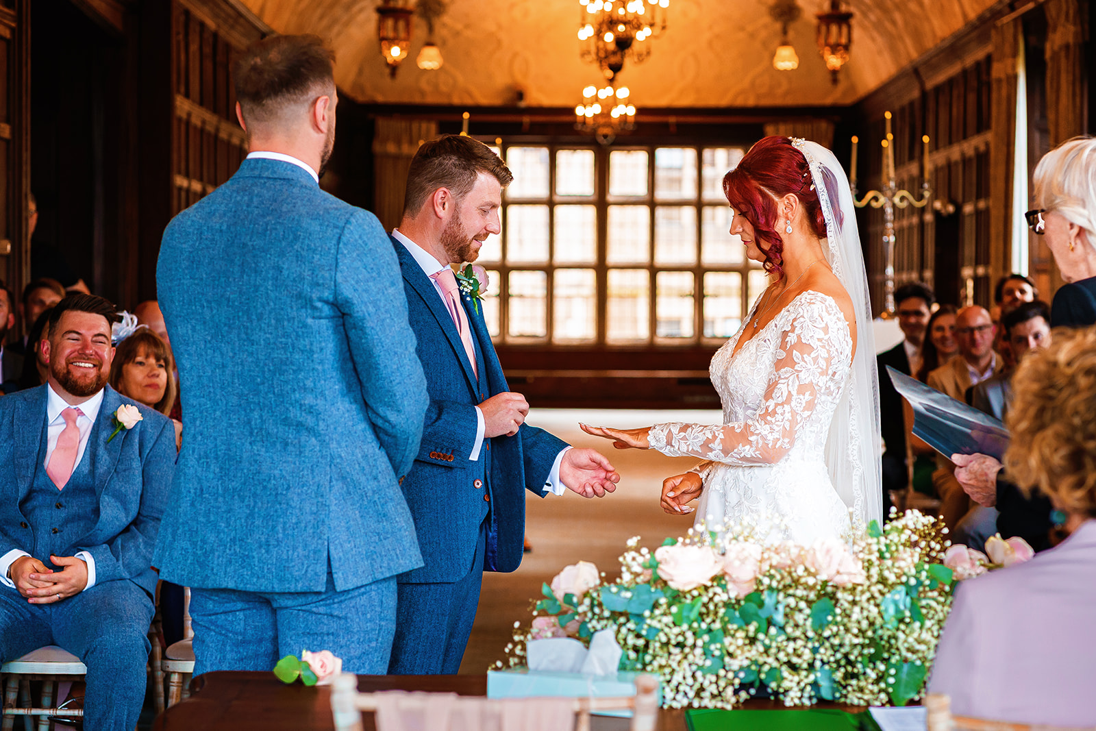 fanhams hall wedding -bride and groom exchange rings