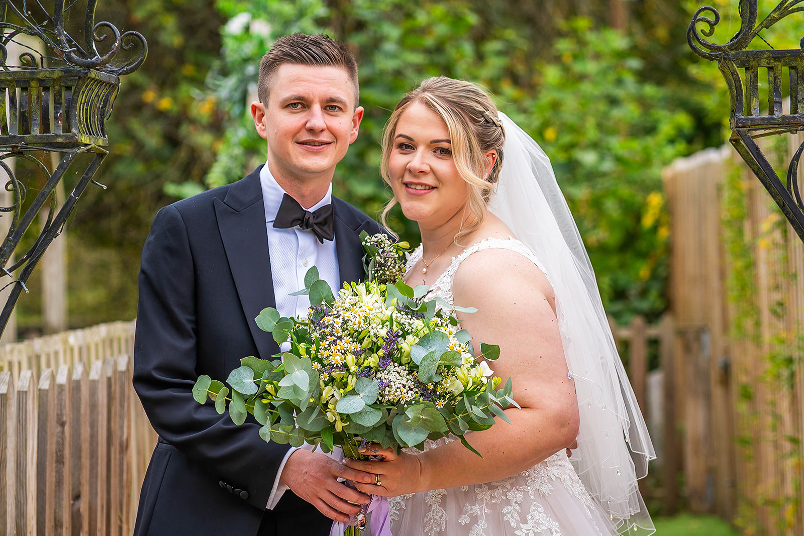 the waterside wedding venue - couple shot under the archway.