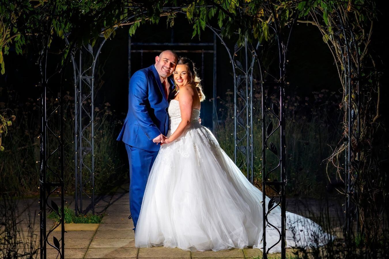 gaynes park - bride and groom at night