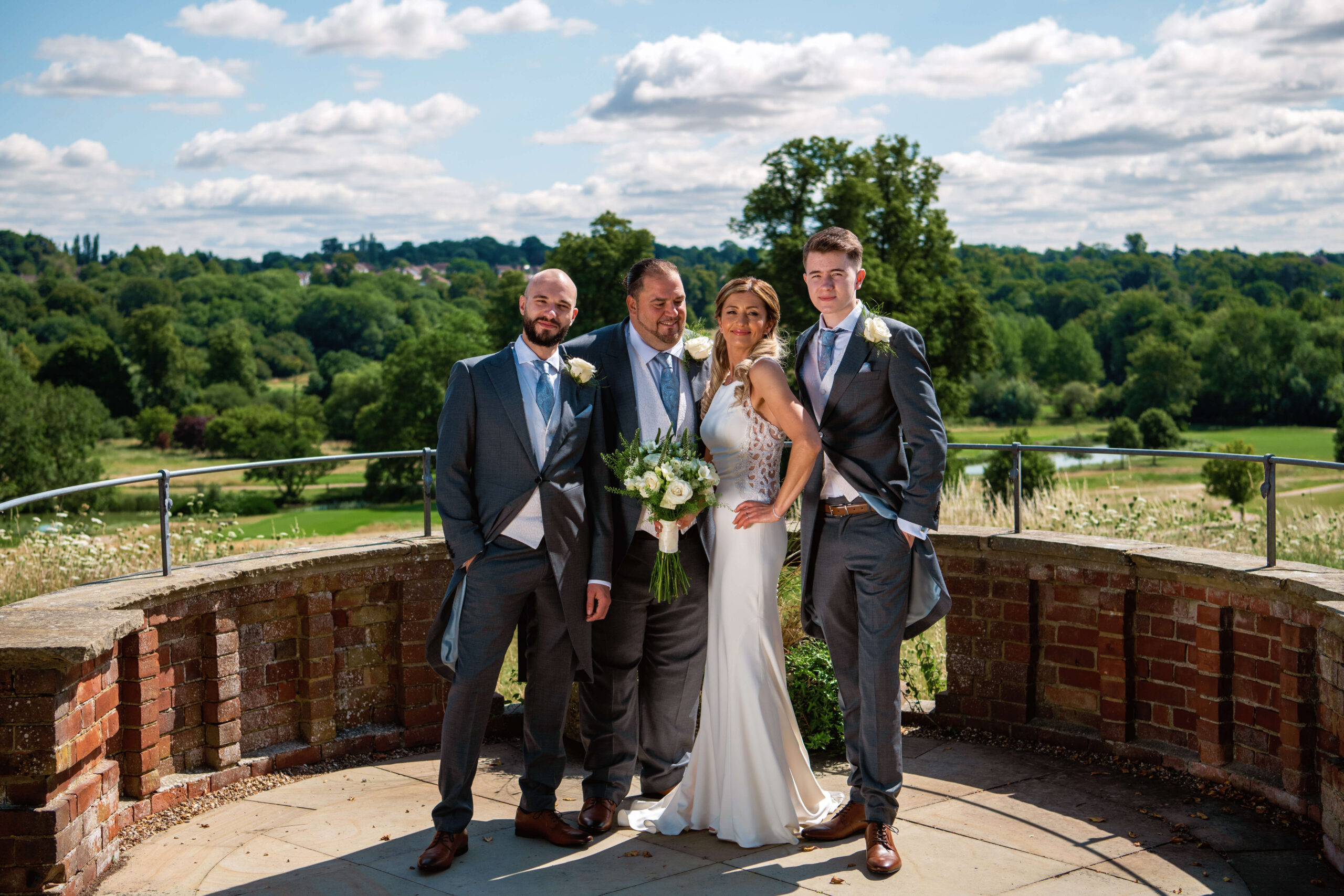 the grove wedding photographer - wedding party group shoot outside