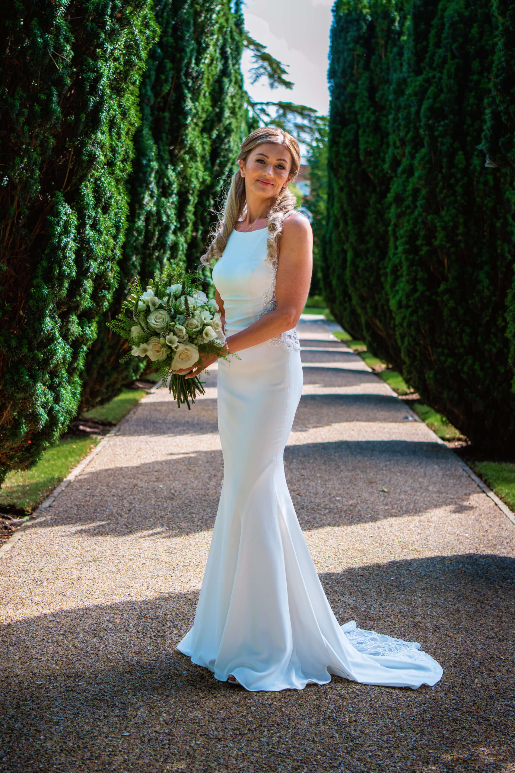 the grove wedding photographer - bridal shot between the trees